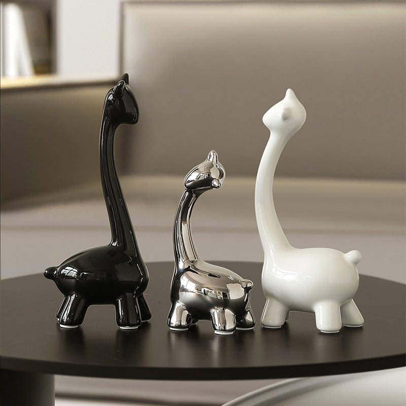 deer figurine of a family of three, and living room