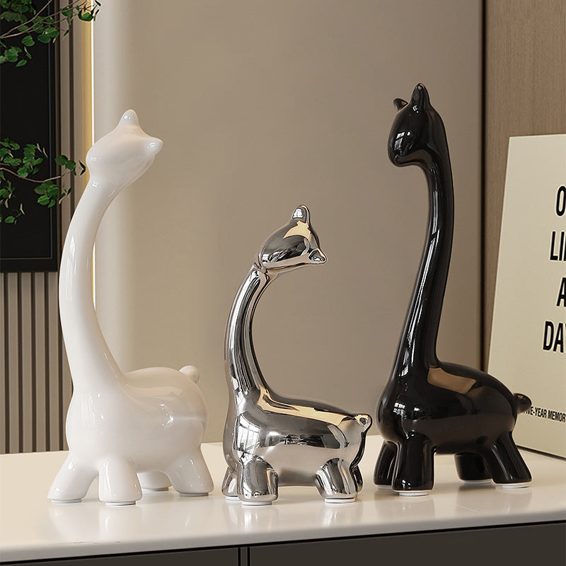 deer figurine of a family of three, and living room